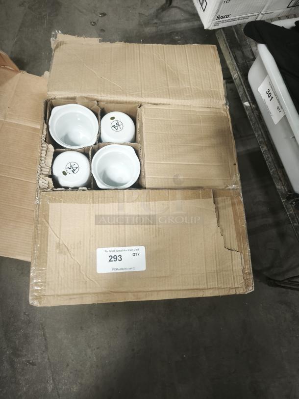 Box of new Aluma white medium porcelain pot pie dishes, four visible. Labels: "293 QTY," indicating quantity.