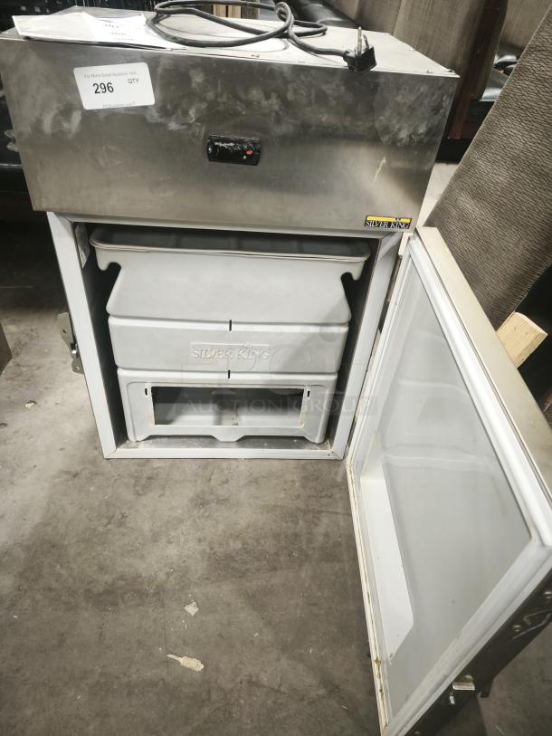 Silver King SKDL25-ESUS2 refrigerated lettuce crisper, stainless steel, door open, showing bins, visible wear, auction tag.