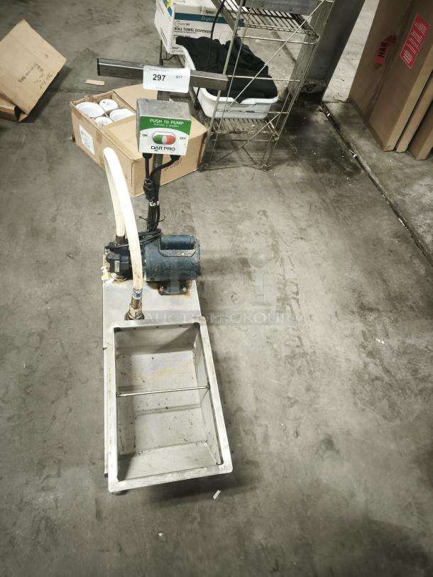 Dar Pro Solutions Grease Caddy on casters, with pump control panel. Visible wear, sturdy construction, efficient handling.