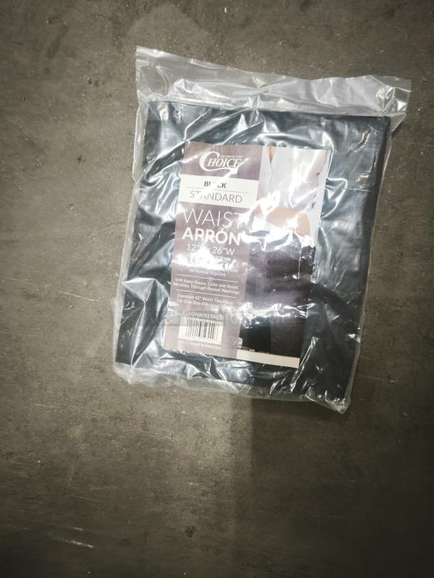 Brand new black 3-pocket restaurant waiter aprons, bib size 26"x12", set of 2 in packaging, with "Choice" brand label.