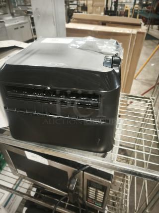 BRAND NEW Sysco Imperial 360 Roll Towel Dispenser, stylish black design, pristine condition, ready for installation.