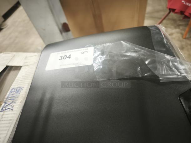 Brand new Sysco Imperial Complete 360 roll towel dispenser, black, with protective film intact. Auction tag reads "304."