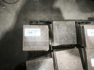 Volcanic granite blocks for cooking, NSF certified, labeled as lot 306. Ideal for enhancing cooking surfaces.