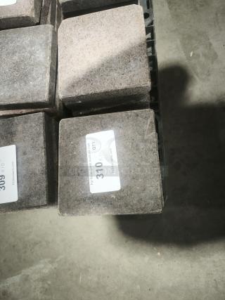 NSF certified volcanic granite slabs for cooking, square, dark stone finish, visible label with quantity and auction details.