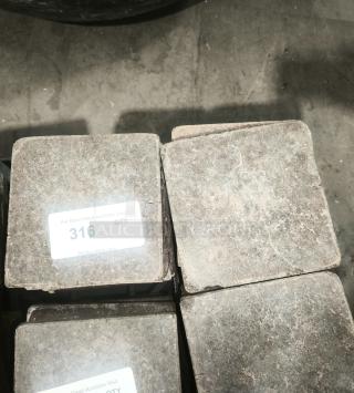 NSF certified volcanic granite slabs for cooking, lightly textured, labeled "316 QTY," suitable for direct food preparation.