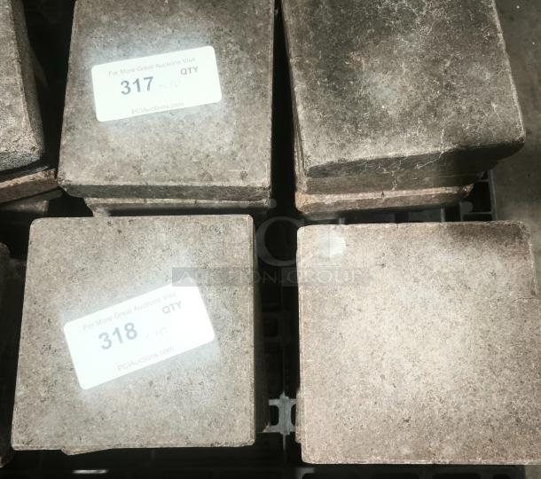 NSF Certified volcanic granite blocks for cooking, showing natural stone texture. Labels marked "317" and "318" indicate quantity.