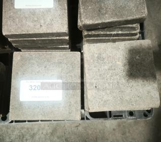 NSF certified volcanic granite slabs for food cooking, quantity of 10, in good condition. Marked with auction tag "320".