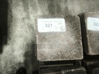 NSF certified volcanic granite slabs for cooking, featuring a label with auction lot number 321. Durable and functional.