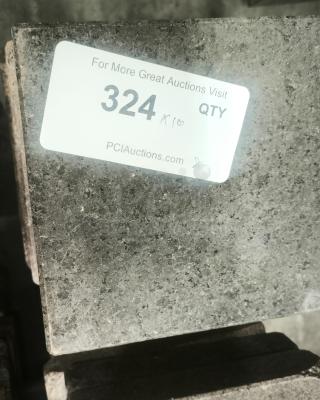 NSF certified volcanic granite slab for cooking, auction tag reading "324 QTY," by PCIAuctions.com.