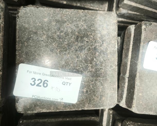 NSF certified volcanic granite cooking stones, square, with visible gray and black speckles, auction lot tag "326" attached.