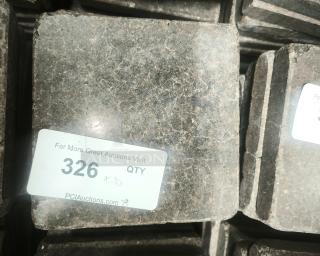 NSF certified volcanic granite cooking stones, square, with visible gray and black speckles, auction lot tag "326" attached.