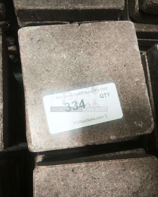 NSF certified volcanic granite slabs for cooking, lot of 10, used condition, visible label for PCI Auctions.