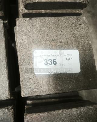 NSF certified volcanic granite slab for cooking, shown with label indicating auction lot number 336.
