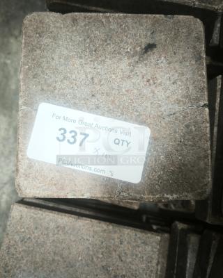 NSF Certified volcanic granite slab for cooking. Features natural texture, durable, with visible inventory label. Suitable for food use.