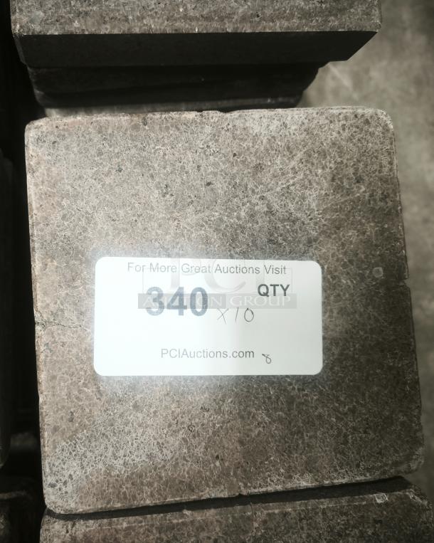 NSF certified volcanic granite cooking stone, labeled "340 x10", textured surface, ideal for cooking, auction item.