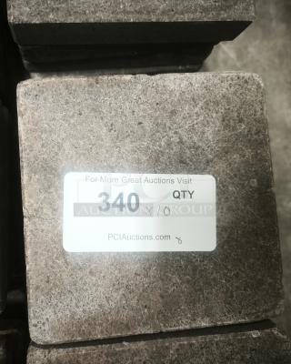 NSF certified volcanic granite cooking stone, labeled "340 x10", textured surface, ideal for cooking, auction item.