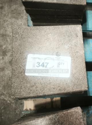 NSF certified volcanic granite slab for cooking, labeled with auction info, quantity of 10. Suitable for culinary use.