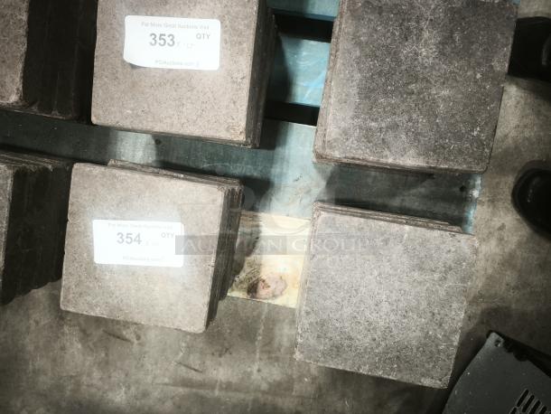 NSF certified volcanic granite slabs for cooking, marked with auction labels 353 and 354. Rustic condition, ideal for chefs.