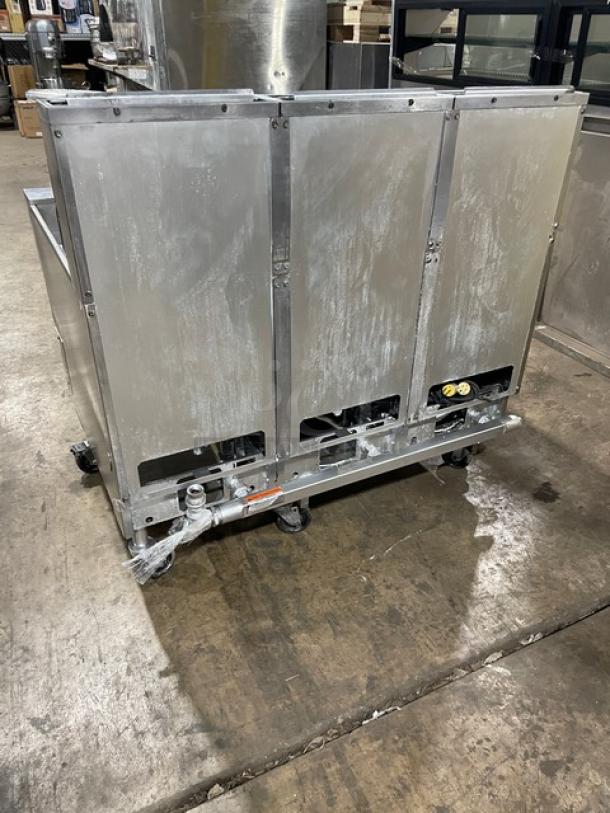 Pitco SG14-JS triple-bay deep fryer, stainless steel, 40 lb capacity, natural gas, with casters, digital control, good condition.