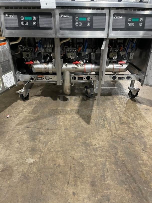 Pitco SG14-JS triple-bay deep fat fryer; stainless steel, digital control, 40 lb capacity, casters, used condition.