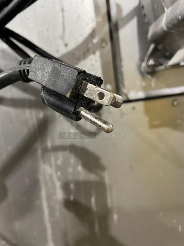 Power plug for CPG FGC100 commercial oven; 120V, 1-phase connection, shows standard three-prong design.