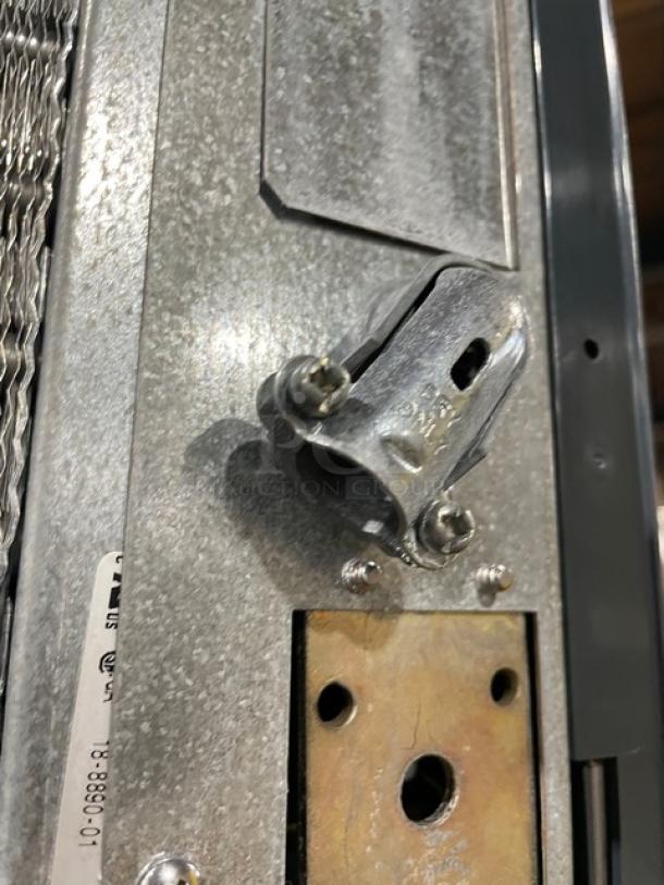 Close-up of Scotsman Prodigy Series ice machine's metal component and mounting details. Model: C0322SA-1A/B322S. Durable stainless steel.