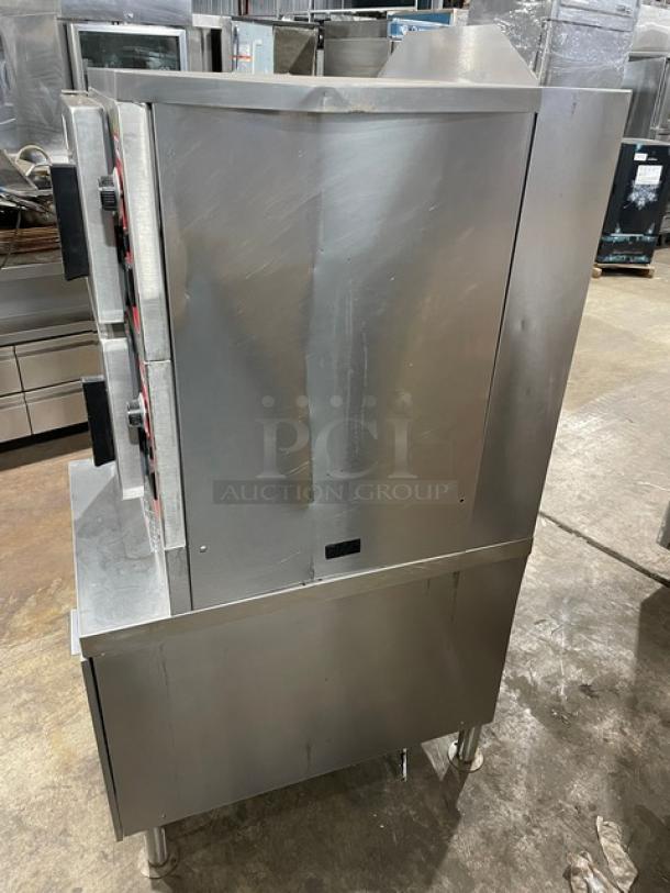 Vulcan VSX24G dual compartment convection steamer, stainless steel, natural gas, with controls, pan rack, on legs, used condition.