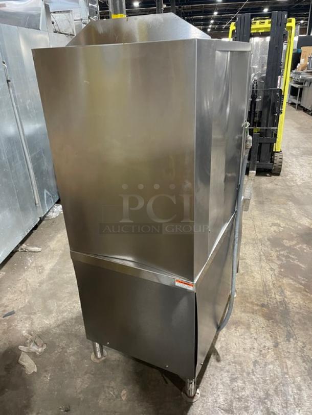 Vulcan VSX24G commercial stainless steel convection steamer, natural gas powered, dual compartments, with pan rack, on legs.