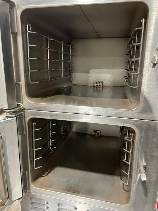 Vulcan VSX24G dual compartment convection steamer. Stainless steel, natural gas, individual controls, built-in pan rack.