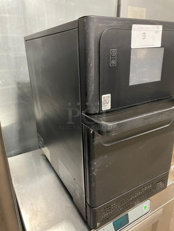 MerryChef Eikon E2S black electric rapid cook oven, countertop model, late model, visible control panel and QR code.