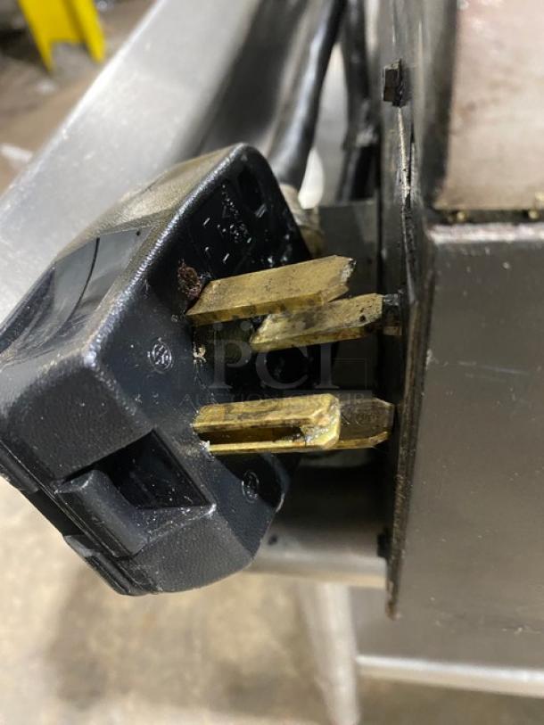 Star Max Series commercial electric countertop griddle with backsplash, single undershelf, and power plug visible, used condition.