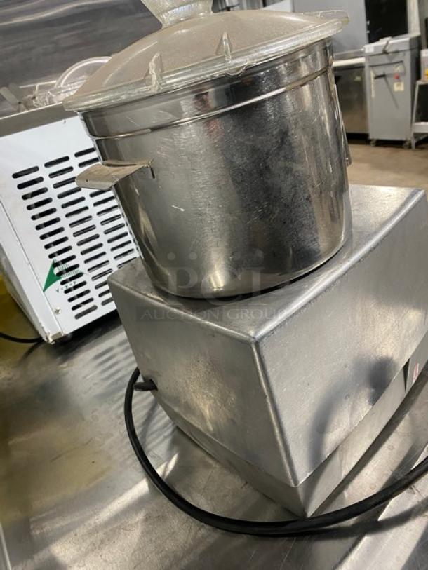 Robot Coupe R602V.V.F food processor with 7 Qt. stainless steel bowl. 120V, 1 phase, countertop model. Slight wear visible.