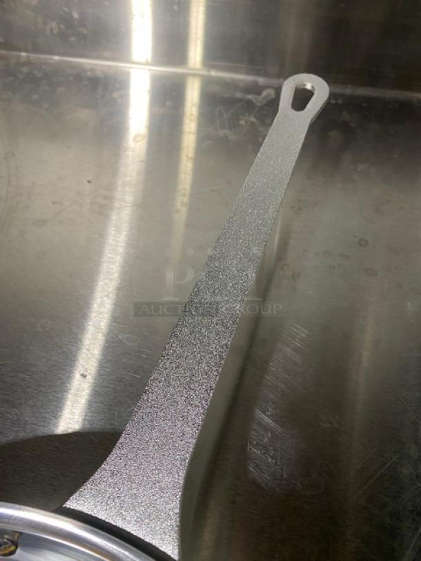 Adcraft Hercules commercial aluminum fry pan, model HER12FP/4, silver handle detail, professional-grade condition.