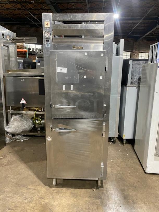 Traulsen stainless steel reach-in refrigerator/freezer combo, Model RDT1-32WUT, with pan slide, chrome rack, 115V, on legs.