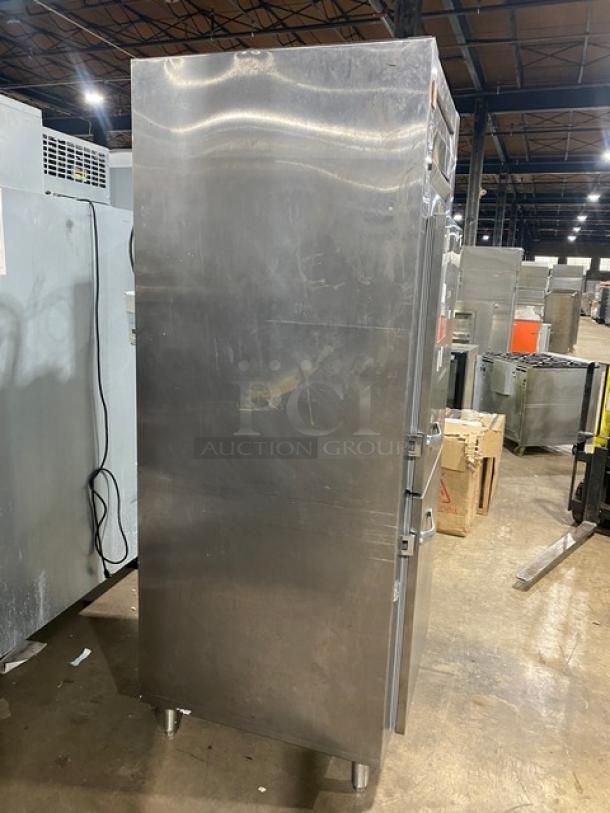 Traulsen stainless steel reach-in refrigerator/freezer combo, model RDT132WUT, with pan slide, wired rack, on legs, serial 158897.