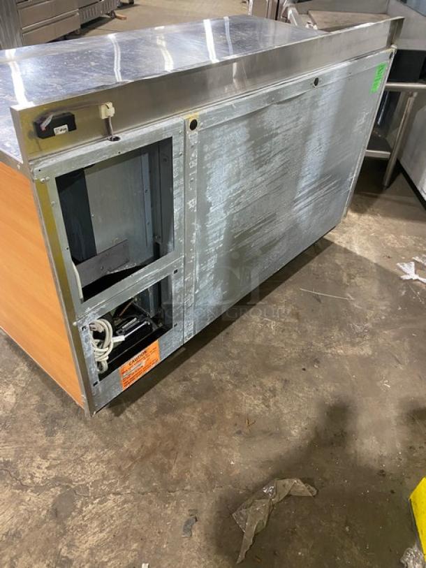 Duke Commercial Stainless Steel 2 Door 60" Worktop Refrigerator, Model RBC-60M, with upturned backsplash, on legs.
