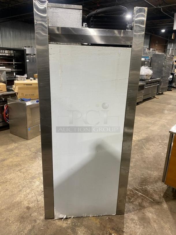 Traulsen stainless steel single door roll-in refrigerator, model RRI1-32LUT, in used condition, commercial grade.