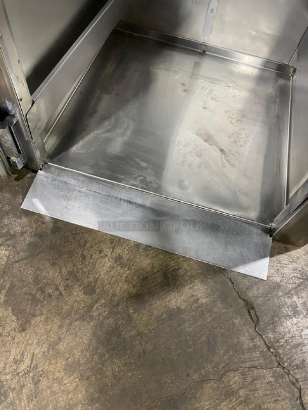 Traulsen stainless steel single door roll-in refrigerator, model RRI1-32LUT, 115V, in good condition. Interior view shown.