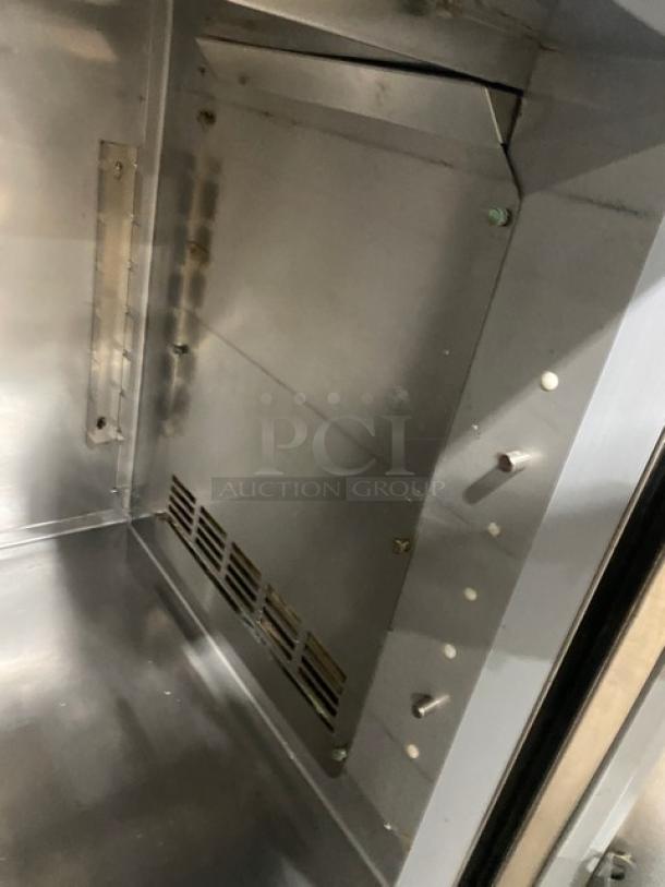 Duke Commercial Stainless Steel 2-Door 60" Worktop Refrigerator, Model RBC-60M, with upturned backsplash, interior view.