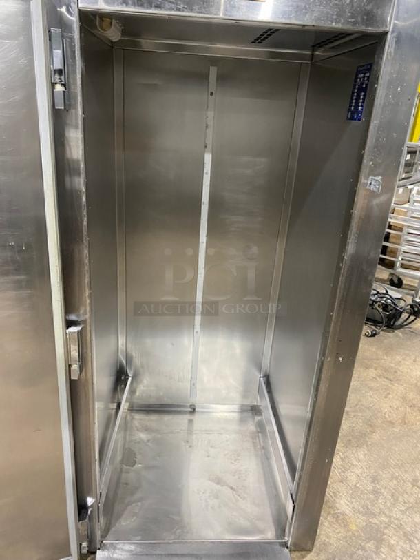 Traulsen commercial stainless steel roll-in refrigerator, model RRI132LUT, single solid door, interior view, 115V 1 Phase.