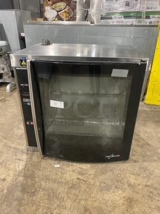 Alto-Shaam stainless steel electric countertop rotisserie oven, digital controls, used condition, clear glass door.