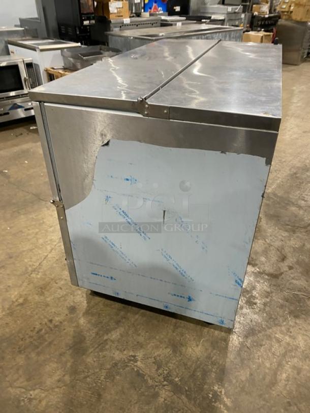 Beverage-Air SM58NS commercial stainless steel milk cooler with poly-coated wired rack, on casters, model SN: 11907446.