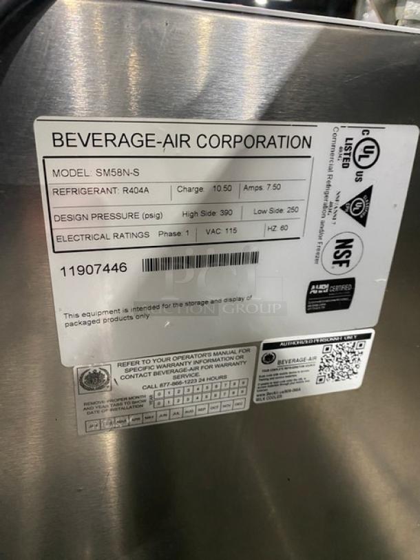 Beverage-Air SM58N-S milk cooler with stainless steel exterior, poly-coated wire rack, 115V, on casters. Model: SM58N-S. Serial: 11907446.