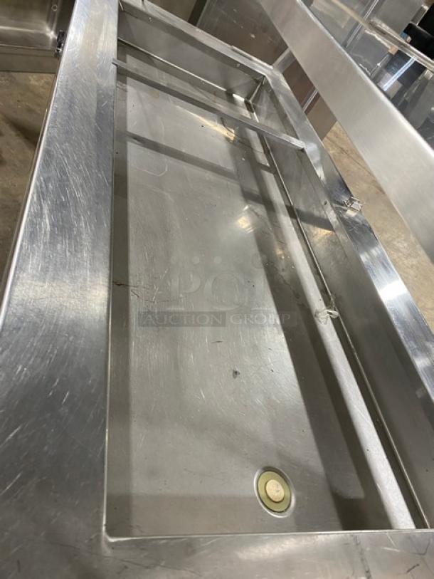 Precision Stainless Steel Refrigerated Salad Bar, model SST2024RTNYC, with double overhead shelf and sneeze guard.