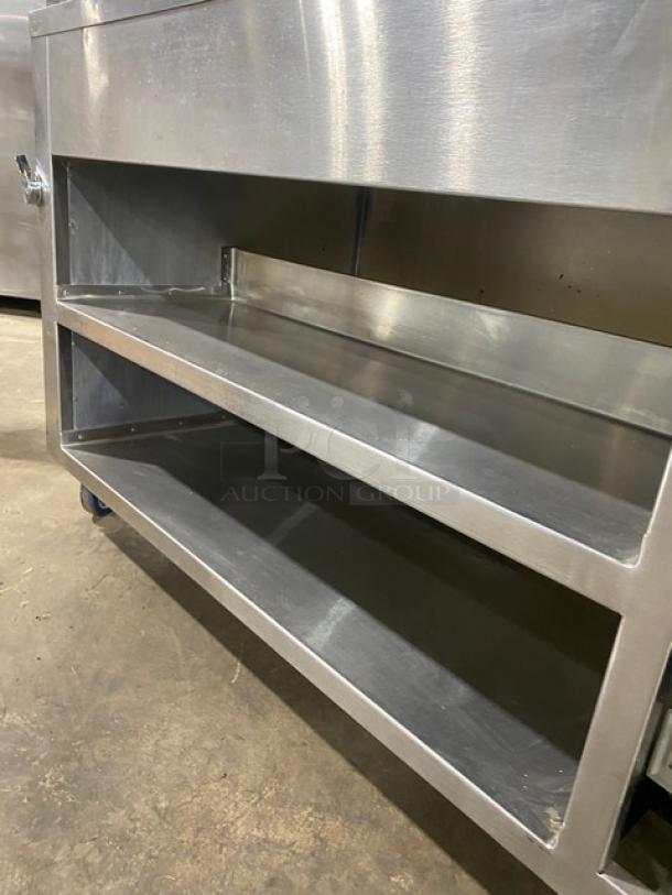 Precision SST2024RTNYC stainless steel refrigerated salad bar with double shelf, sneeze guard, casters, and enclosed dry base.