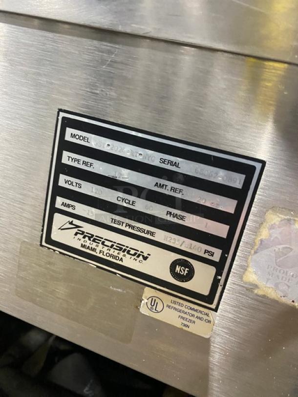 Precision SST2024RTNYC refrigerated food bar, stainless steel, model and serial number label visible, 120V, 1 Phase.