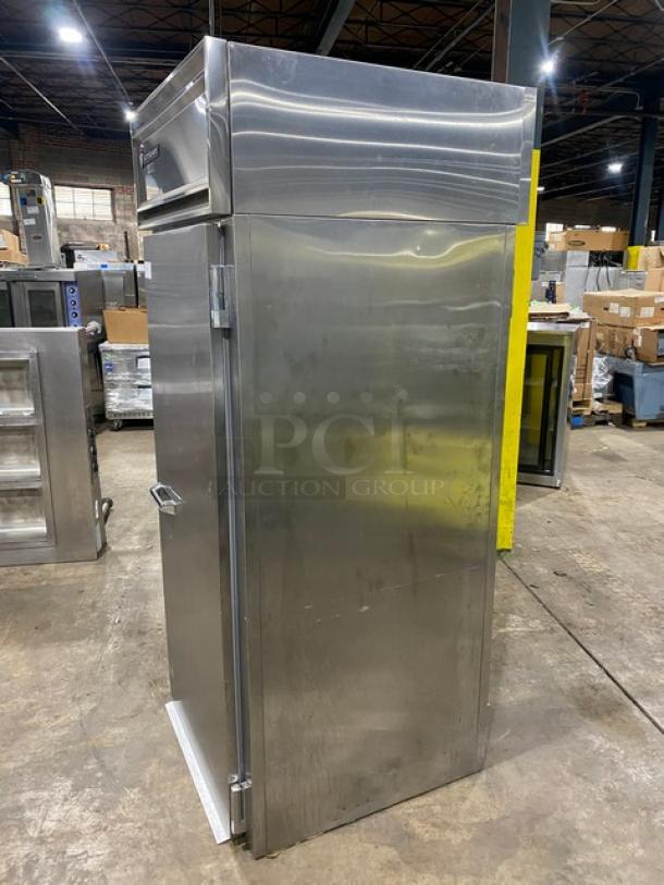 Victory commercial stainless steel roll-in pass-thru refrigerator, Model RIS1DS7PT, in used condition, single solid door.