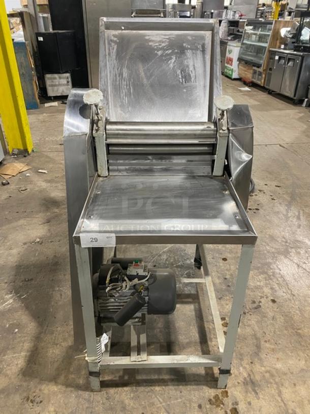 Commercial stainless steel electric dough roller/sheeter on legs, high speed, used condition, visible motor underneath.