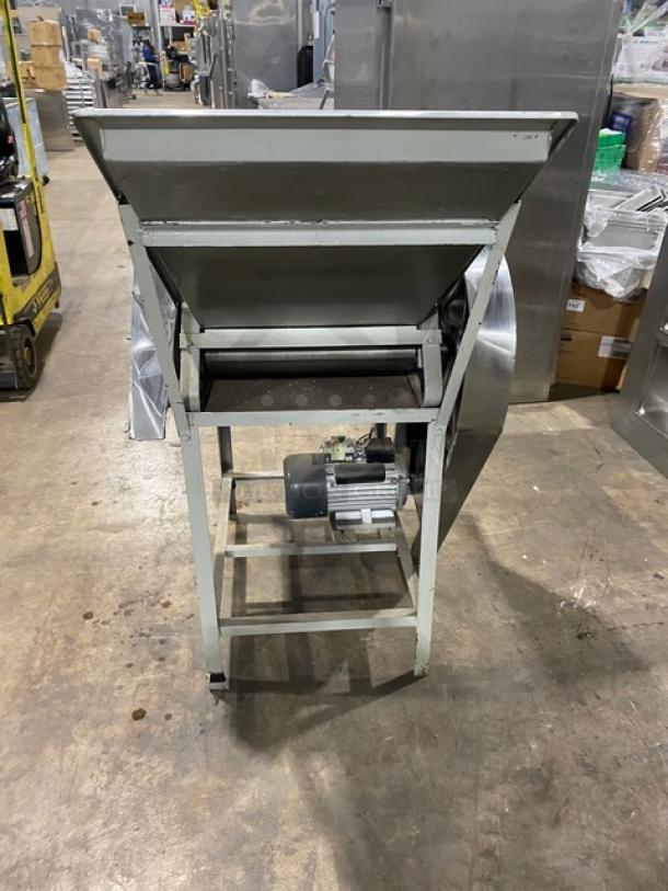 Commercial stainless steel electric dough roller/sheeter on legs. Features high-speed operation. Used condition.