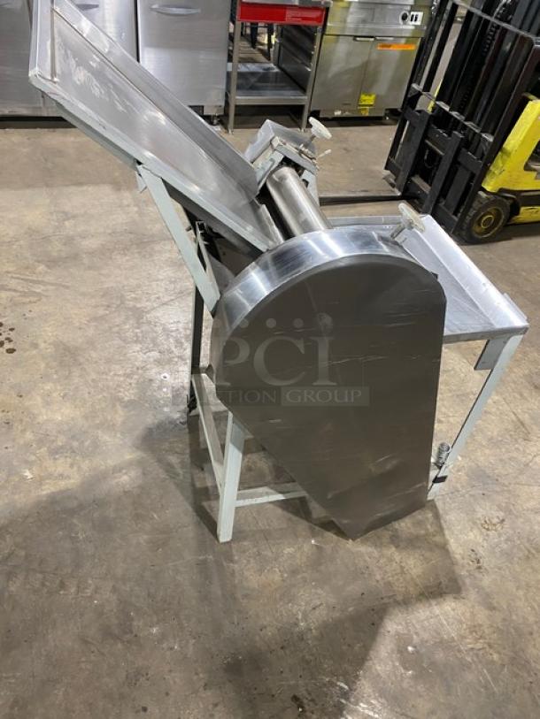 Commercial stainless steel electric dough roller/sheeter, free-standing with high speed rollers, on sturdy legs.